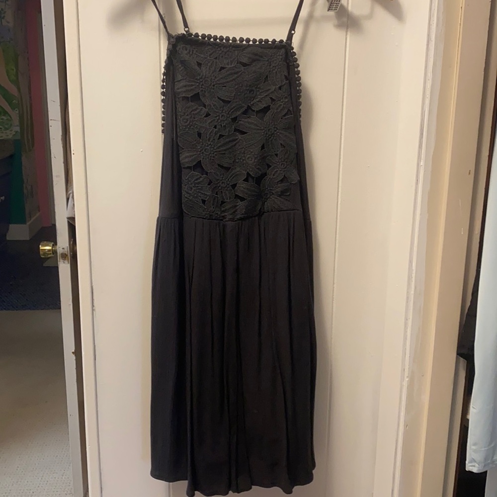 Super cute dark grey/black romper. Loose, comfy, pretty detailing on top
